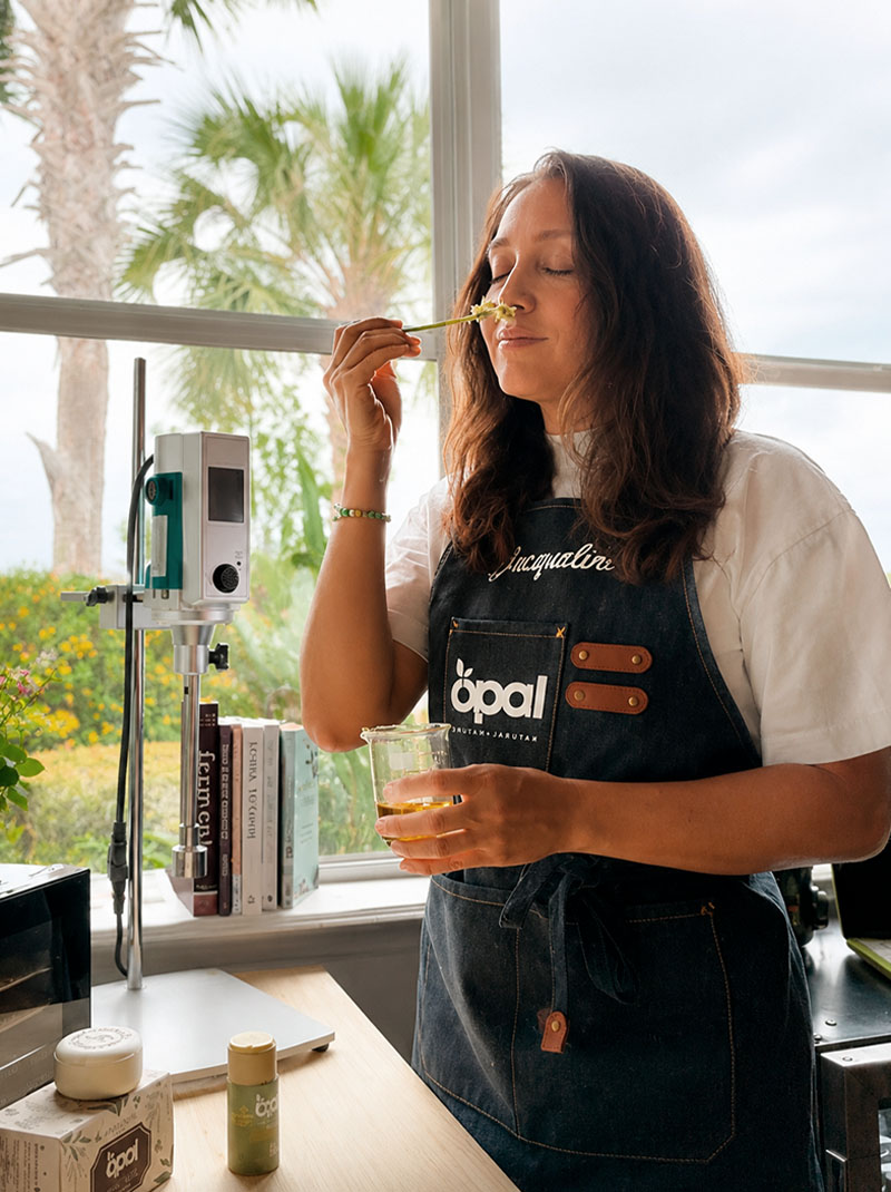 Alexandra, founder of Opal Nature, creating handcrafted natural skincare products in her artisan workshop.